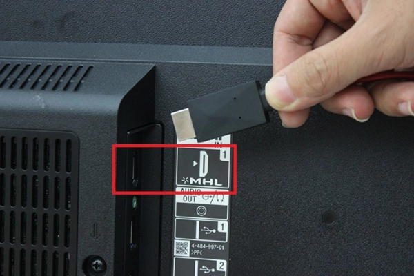 Connect the HDMI end of the MHL cable to the HDMI port